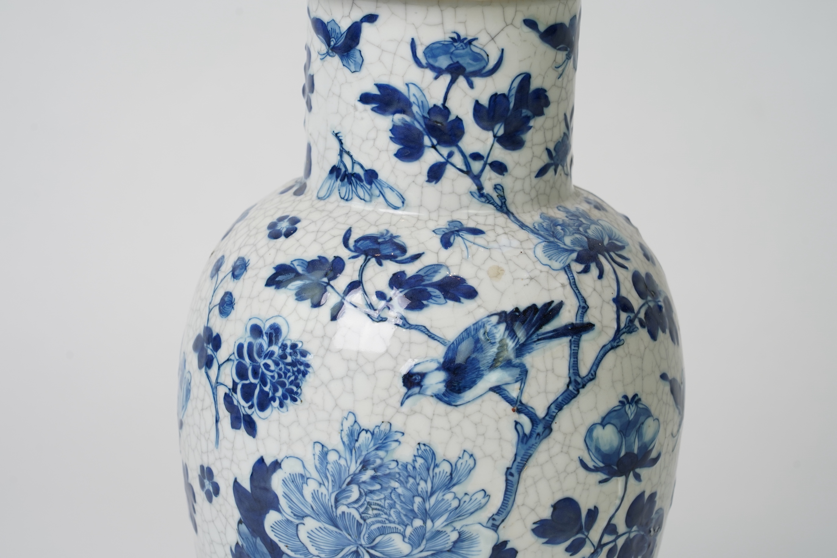 A Chinese blue and white crackle glaze baluster vase and cover, early 20th century